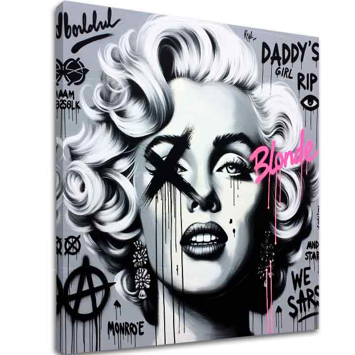 Marilyn Monroe pop-art stílusú, fekete-fehér portréja látható a vászonképen, rózsaszín és fekete graffitivel kiegészítve, látható fakerettel, Papilora.