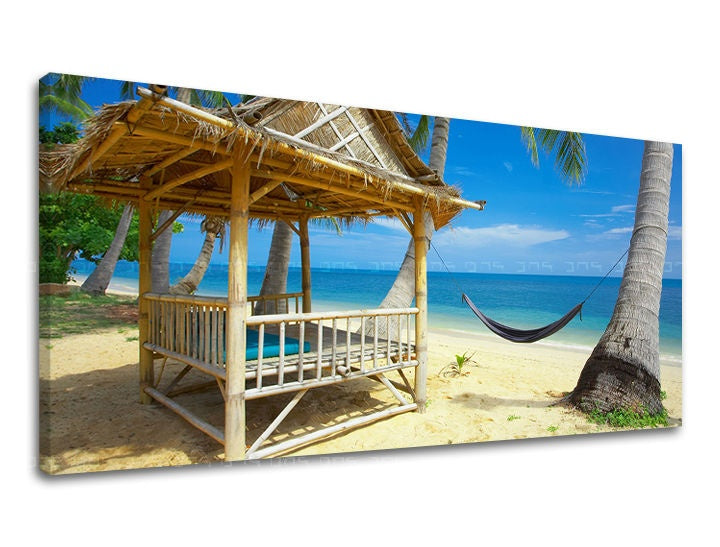 Boho stílusú vászonkép motívummal: PANORÁMA STRAND, pálmák, óceán, tengerpart, tenger és tengerpart bézs-kék árnyalatokban, relaxáló hangulat, háromrészes kivitel – fő