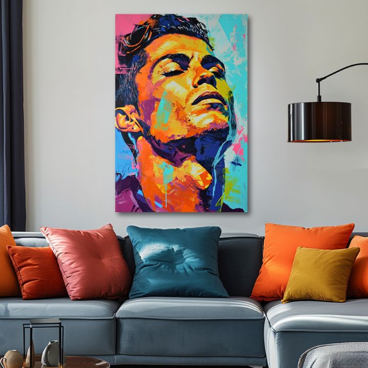 Modern vászonkép motívummal: Cristiano Ronaldo - Energia víťaza narancs-lila árnyalatokban, energikus hangulat, dicsőség | Kép Cristiano Ronaldo - Energia víťaza – termék