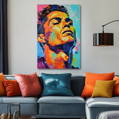 Modern vászonkép motívummal: Cristiano Ronaldo - Energia víťaza narancs-lila árnyalatokban, energikus hangulat, dicsőség | Kép Cristiano Ronaldo - Energia víťaza – termék