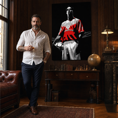 Kézzel festett POP Art festmény Ruud van Nistelrooy 1 darab rvn rvn – kép modern férfi belső térben, lifestyle vizualizáció. Domináns színek: fekete, piros, fehér, szürke.