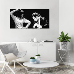 Pop art vászonkép motívummal: Pulp Fiction, férfi öltönyben, természet fehér-fekete árnyalatokban, drámai hangulat, alkalmas a iroda számára – fő